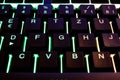 Makro closeup of green illuminated computer keyboard keys Royalty Free Stock Photo