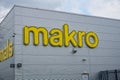 Makro wholesale sign on the side of a building