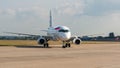 MAKS-2015. Russian short-haul narrow-body passenger aircraft Sukhoi Superjet 100 moves along taxiway after flight.