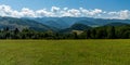 Mala Fatra and lower hills of Kysucka vrchovina mountains from meadow bellow Zlien hill near Lutise in Slovakia Royalty Free Stock Photo