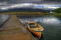 Mala Prespa lake and the pier of Mikrolimni village Royalty Free Stock Photo