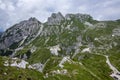 Mala Spice Cime Verdi peaks view from Mangart saddle, Slovenia\'s Highest Panoramic Road, heavy clouds before rain, foggy day