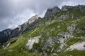 Mala Spice Cime Verdi peaks view from Mangart saddle, Slovenia\'s Highest Panoramic Road, heavy clouds before rain