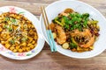 Mala Xiang Guo stir-fry pot, and Mapo Toufu bean curd, China Chinese Sichuan Chengdu Chongqing spicy food on table Royalty Free Stock Photo