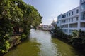 Malacca, Malaysia - August 10, 2022: Along the Melaka river in the old town. Bars and restaurants line the course of the river. Royalty Free Stock Photo