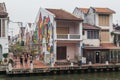 Malacca, Malaysia - circa September 2015: Riverside promenade with historical houses along Sungai Melaka, Malacca, Malaysia Royalty Free Stock Photo