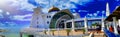MALACCA, MALAYSIA - DECEMBER 29, 2019: Tourists enjoy Melaka Straits Mosque on a beautiful sunny day, panoramic view