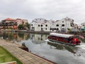 Malacca river cruise with  historical building background Royalty Free Stock Photo