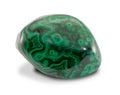 Malachite gemstone with beautiful surface texture, isolated on white background. Rounded smooth surface.