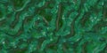 Malachite green shiny wavy relief stone shapes, nature seamless pattern marbled Royalty Free Stock Photo