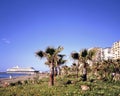 Malaga beach with palms, flowers, sand Royalty Free Stock Photo