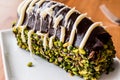 Malaga Dessert / Chocolate Eclairs with peanut and banana Royalty Free Stock Photo