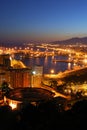 Malaga Port and bullring at night. Royalty Free Stock Photo