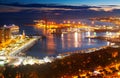 Malaga with Port from castle in evening. Spain Royalty Free Stock Photo