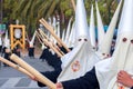 MALAGA, SPAIN - APRIL 09: Nazarenes and musicians from Semana Sa