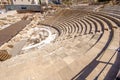 MALAGA, SPAIN- AUGUST 23, 2014: Ancient Roman Theatre near Malaga Alcazaba castle on Gibralfaro mountain, Andalusia, Spain. The p Royalty Free Stock Photo