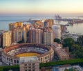 Malaga port and Bullfighting arena Royalty Free Stock Photo