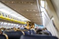 Passengers boarding plane wearing face masks