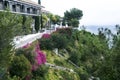 Malaga, Spain, February 2019. Beautiful villa against the backdrop of the Mediterranean is immersed in spring flowers.