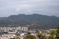 Malaga, Spain, February 2019. Panorama of the Spanish city of Malaga. Buildings against a cloudy sky. Dramatic sky over the city