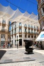 Modern sculpture along the Calle Marques de Larios main shopping street, Malaga, Spain.