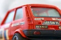 Old slot car of the Spanish brand Scalextric, replica model of a red Renault 5 decorated with the French flag