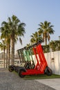 Electric Scooters Rollers Parked in City Center Ready to Use Again