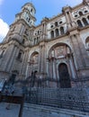 View at the front facade at the Malaga Cathedral or Santa Iglesia Catedral BasÃÂ­lica de la EncarnaciÃÂ³n, and Obispo square with