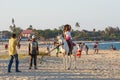 Malagasy beauty, beautiful girls ride horse on the beach