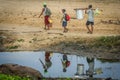 Malagasy family walking home