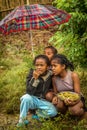 Malagasy kids in the rain Royalty Free Stock Photo