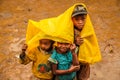 Malagasy kids in the rain