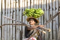 Malagasy woman with bananas