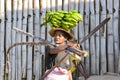 Malagasy woman with bananas