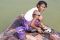 Malagasy woman and fishes
