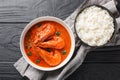 Malai curry dish combines prawns with coconut milk, onion, ginger, garlic paste, tomato, and ground spices and is served with Royalty Free Stock Photo