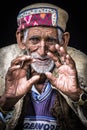 Portrait of an exotic elderly man from a village in northern India. Royalty Free Stock Photo