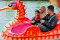 The family ride duck boat at the public park, vacation time