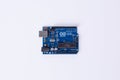 Top view of Arduino Uno microcontroller board on white background Royalty Free Stock Photo