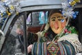 Malanka_ Man in a festive costume and mask in car