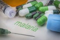 Malaria, medicines and syringes as concept