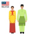 Malasian young man and woman in national costume Royalty Free Stock Photo