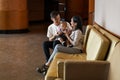 Malay Asian Young Couple with One Year Old Child Daughter, full length portrait
