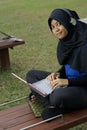 Malay female teen study laptop