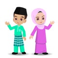 Malay girl and boy with hari raya new clothes Royalty Free Stock Photo