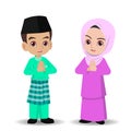 Malay girl and boy celebrating hari raya aidilfitri Royalty Free Stock Photo