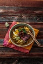 Malay mee rebus with beef, eg and onion in a bowl, copy space Royalty Free Stock Photo