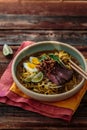Malay mee rebus with beef, eg and onion in a bowl, copy space Royalty Free Stock Photo