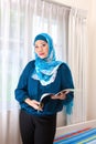 Malay woman in modern clothing and scarf