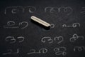 Malayalam alphabets written on a kid`s slate